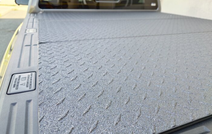 LOMAX Pro Tri-Fold Bed Cover (Diamond Plate Finish) installed